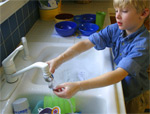 Child using sink